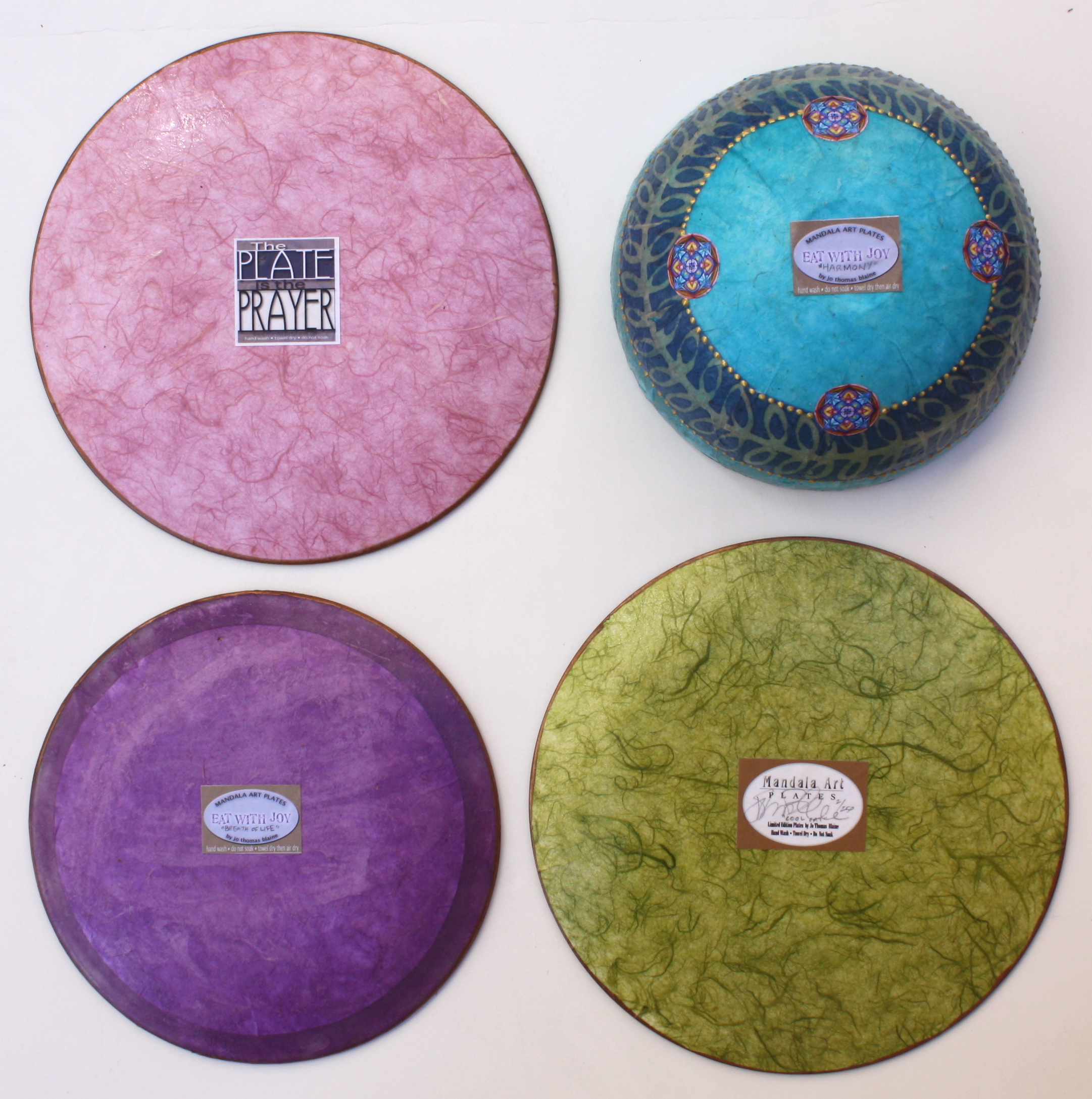 clockwise from upper left: back of 10", back of bowl, back of 10", back of 9"